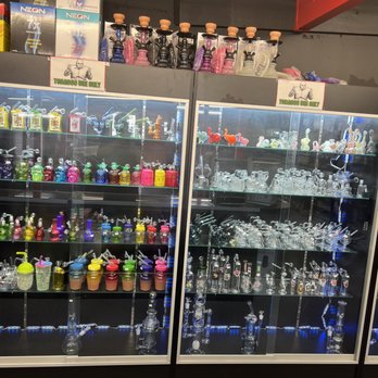Sam’s Smoke Shop - a display of alcohol bottles - Beer, Wine & Spirits Near Me - Hanford, California Sam’s Smoke Shop - a display of alcohol bottles - Beer, Wine & Spirits Near Me - Hanford, California