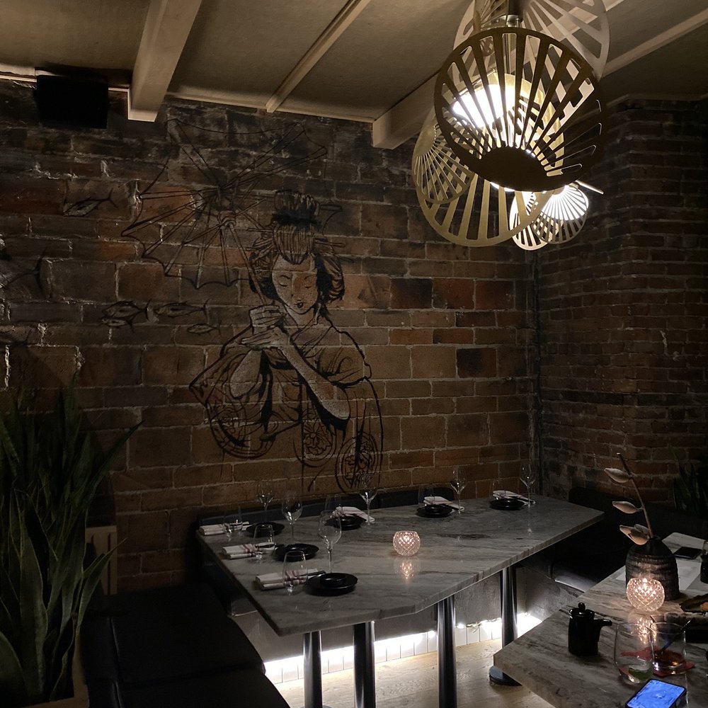 Sushi Hidden Fish - a dining room with a table and chairs - Japanese Near Me - Montreal, Quebec Sushi Hidden Fish - a dining room with a table and chairs - Japanese Near Me - Montreal, Quebec