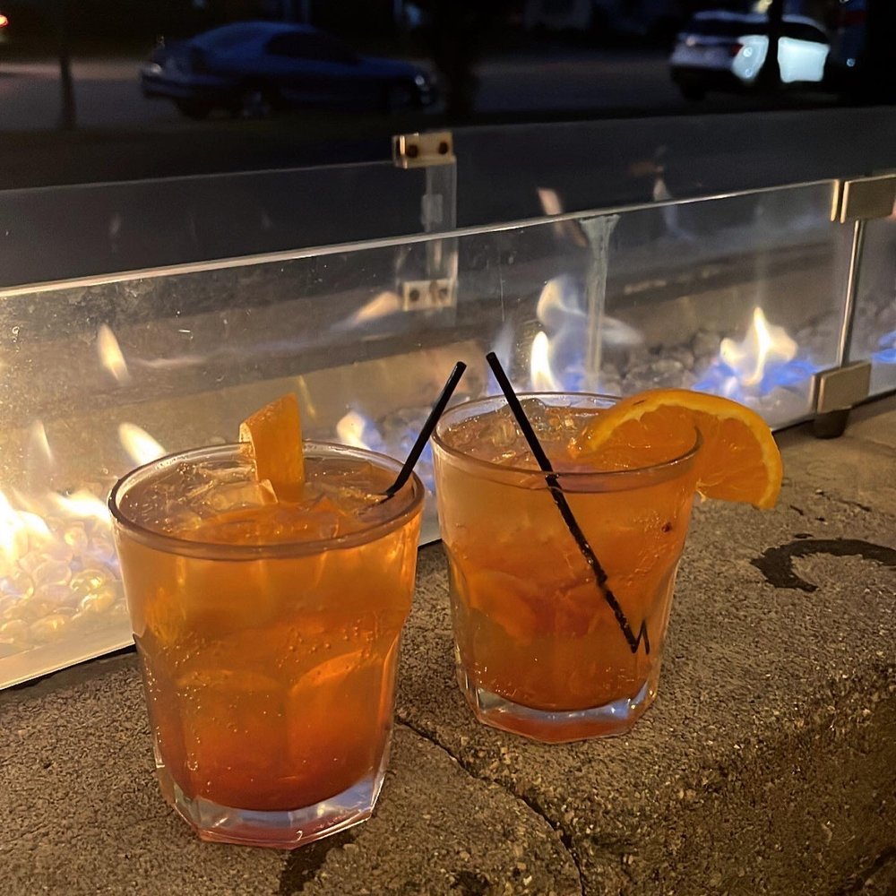 Capri di Nuovo - two glasses of orange juice - Italian Near Me - West Allis, Wisconsin Capri di Nuovo - two glasses of orange juice - Italian Near Me - West Allis, Wisconsin