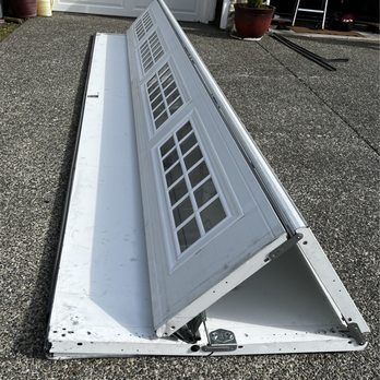 The Garage Door Works - Our sad door - Garage Door Services Near Me - Redmond, Washington