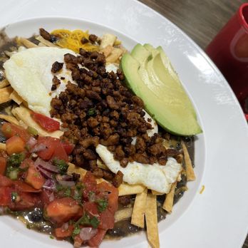 Famous Toastery - Huevos Rancheros w/ chorizo ($16) + coffee ($4). - Breakfast & Brunch Near Me - Charlotte, North Carolina Famous Toastery - Huevos Rancheros w/ chorizo ($16) + coffee ($4). - Breakfast & Brunch Near Me - Charlotte, North Carolina