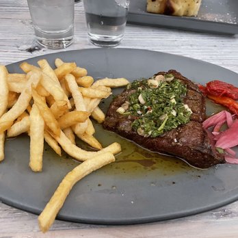 Tribe at Riverwalk - Steak and fries with Chimichurri is to die for - New American Near Me - Castle Rock, Colorado Tribe at Riverwalk - Steak and fries with Chimichurri is to die for - New American Near Me - Castle Rock, Colorado
