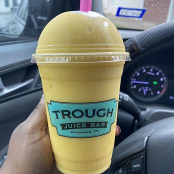 Trough Juice Bar - Orange Ya Glad. Orange, pineapple, mango, flaxseed and maca, topped with granola. - Salad Near Me - Richmond, Texas