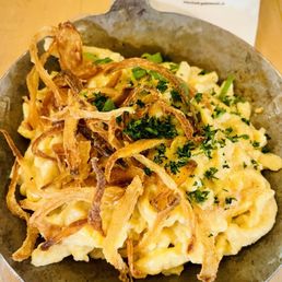 Spätzle mit Kässe at Früh in Cologne, Germany. Spätzle mit Kässe at Früh in Cologne, Germany.