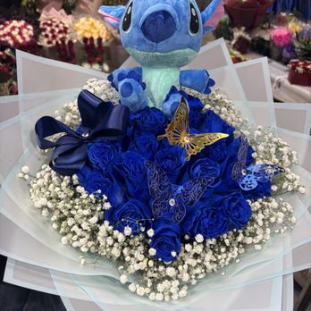 Alexander Flower - Stitch doll with blue roses - Florists Near Me - Los Angeles, California Alexander Flower - Stitch doll with blue roses - Florists Near Me - Los Angeles, California