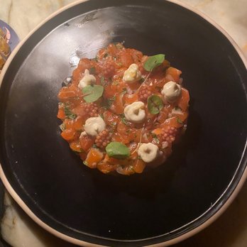 Bordello Cocktail Club - a plate of food on a table - Bars Near Me - Brooklyn, New York Bordello Cocktail Club - a plate of food on a table - Bars Near Me - Brooklyn, New York