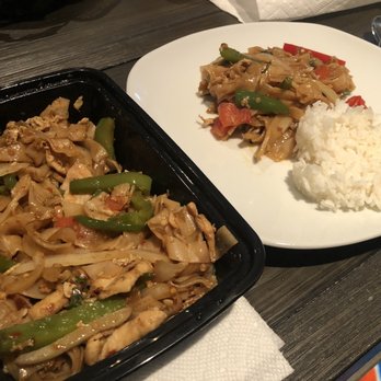 Real Thai Cuisine - Chicken Drunken Noodle on left. Chicken Sweet & Sour stir fry on right. - Thai Near Me - Grand Rapids, Michigan Real Thai Cuisine - Chicken Drunken Noodle on left. Chicken Sweet & Sour stir fry on right. - Thai Near Me - Grand Rapids, Michigan