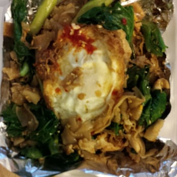 Ubon Thai Kitchen - Pad see ew chicken with fried egg and extra Chinese broccoli. Fresh ingredients and well made. I put chili on top. Yum. - Thai Near Me - Torrance, California