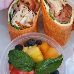 Ambiance Cafe - Turkey club wrap. Fruit salad.