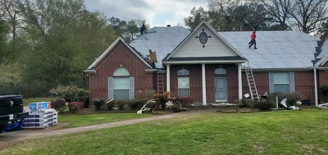 Slide of EJM Roofing & Remodeling