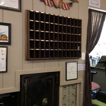 Concord's Colonial Inn - Lobby with an older safe, key room holder and American Eagle - Hotels Near Me - Concord, Massachusetts Concord's Colonial Inn - Lobby with an older safe, key room holder and American Eagle - Hotels Near Me - Concord, Massachusetts