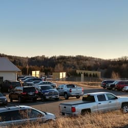 A-1 Archery - Here is a picture of a busy evening at A-1 Archery. You can see the large parking lot along with part of the 80 yard outdoor shooting range.