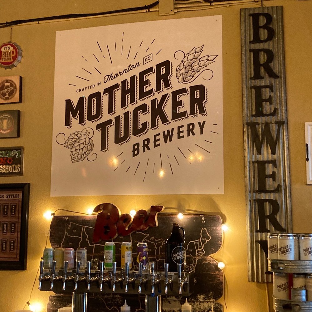 Mother Tucker Brewery - a display of beer bottles - Breweries Near Me - Thornton, Colorado Mother Tucker Brewery - a display of beer bottles - Breweries Near Me - Thornton, Colorado