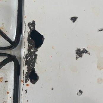 Beal Properties - Hole in oven - Property Management Near Me - Chicago, Illinois