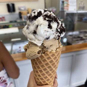 Sweet Alps Ice Cream - Reeces Monster Mash (peanut butter) and Cookies & Cream in a homemade waffle cone. So delicious!! - Ice Cream & Frozen Yogurt Near Me - Summerfield, Florida