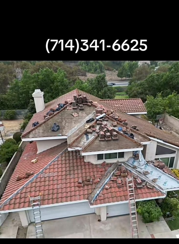 Slide of Tecun’s Roofing