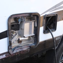 J M RV Rentals - This was rented by a friend. Door missing on the outside.