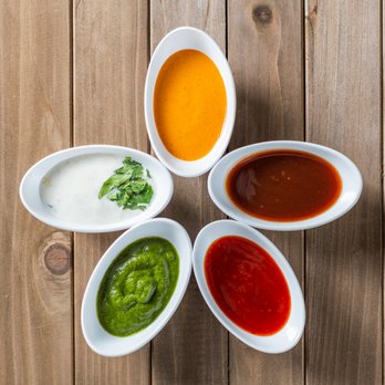 Bombay Eats - Dip till your hearts content ... Tikka Masala, Bombay Fire, Hot & Sweet Ketchup, Cilantro Mint, Yogurt Raita. - Indian Near Me - Chicago, Illinois Bombay Eats - Dip till your hearts content ... Tikka Masala, Bombay Fire, Hot & Sweet Ketchup, Cilantro Mint, Yogurt Raita. - Indian Near Me - Chicago, Illinois