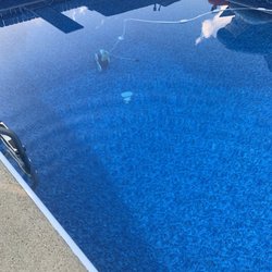 Sos Pools - Liner install. Beautiful color suggestion from Shane, the owner. The white in this pic is a cloud reflection from the water.