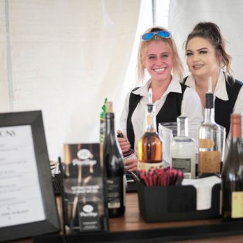 Pour Boys - Taylor and Ashley at the Dunes Center's 2022 20s Gala and Auction! - Bartenders Near Me