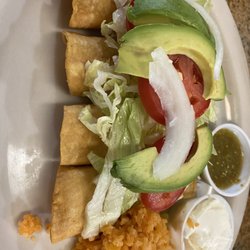 Nachos Mexican Dining - Chicken flautas.
