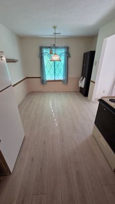 Luxury Vinyl Plank Flooring - For this remodel, I removed all carpet and tackboards and installed LVP flooring throughout the entire condo, featuring seamless threshold seams.