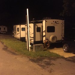 Alligator Lake Recreation Site and RV Park - Site ten at night. Concrete pull-thru. 50/30/20 amp, sewer and water.
