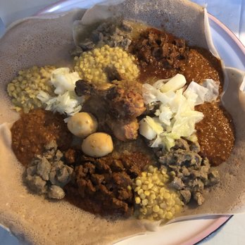Ethiopian Restaurant - Combination #2 goat,beef split peas, lentils, eggs, cabbage and potatoes - Ethiopian Near Me - Denver, Colorado Ethiopian Restaurant - Combination #2 goat,beef split peas, lentils, eggs, cabbage and potatoes - Ethiopian Near Me - Denver, Colorado