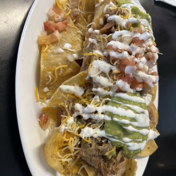 Sinaloa Mexican & Seafood - Carnitas nachos - Seafood Near Me - Oceanside, California Sinaloa Mexican & Seafood - Carnitas nachos - Seafood Near Me - Oceanside, California