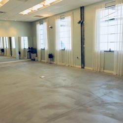 Our large, private group fitness studio with lots of natural light!