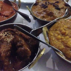 The Clove - Four curries , butter chicken, banana & lentil, goat and beef korma