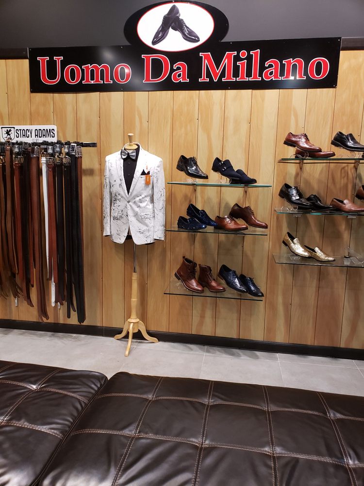 Uomo Da Milano Logo