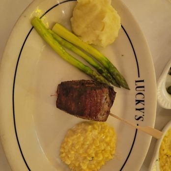 Luckys Steakhouse - Filet mignon, creamed corn, asparagus and mashed potatoes... delicious! - Steakhouses Near Me - Montecito, California