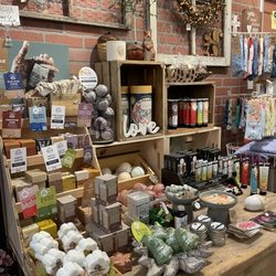 Acorn Flowers & Gifts - Peach's soaps and bath bombs. Dionis hand cream and lip balm. Conscious Step socks.