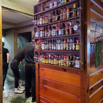 Knotty Pine On the Bayou - Hot sauces on the wall next to the hostess stand - Cajun/Creole Near Me - Cold Spring, Kentucky Knotty Pine On the Bayou - Hot sauces on the wall next to the hostess stand - Cajun/Creole Near Me - Cold Spring, Kentucky