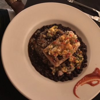 Mayas - Grilled mahi-mahi with black beans n rice topped with a tropical like pico - Latin American Near Me - New Orleans, Louisiana Mayas - Grilled mahi-mahi with black beans n rice topped with a tropical like pico - Latin American Near Me - New Orleans, Louisiana