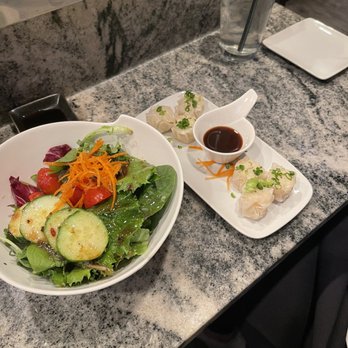 Sushi Cafe - House salad and steamed gyoza - Sushi Bars Near Me - Ocean City, Maryland Sushi Cafe - House salad and steamed gyoza - Sushi Bars Near Me - Ocean City, Maryland