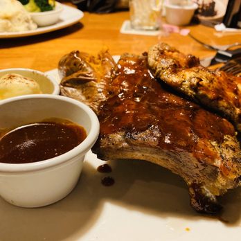 Outback Steakhouse - DROVER'S RIBS AND CHICKEN PLATTER 1/2 order of baby back ribs and wood-fire grilled chicken breast with Sweet Potato - Steakhouses Near Me - Rochelle Park, New Jersey Outback Steakhouse - DROVER'S RIBS AND CHICKEN PLATTER 1/2 order of baby back ribs and wood-fire grilled chicken breast with Sweet Potato - Steakhouses Near Me - Rochelle Park, New Jersey