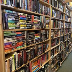 The Dusty Shelf - Book stacks