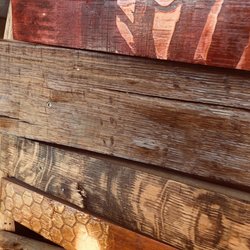 Idle Hour Tasting Room - Barrel stave artwork on the tasting room counter.