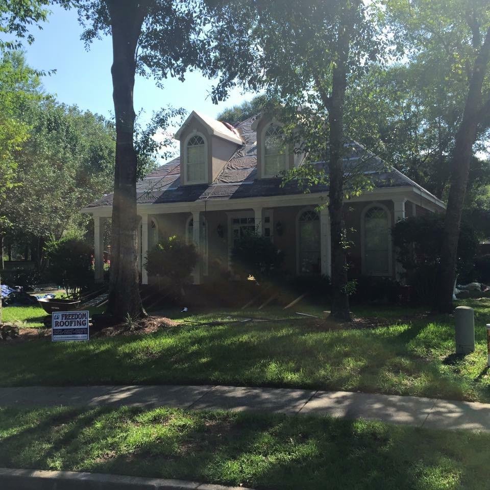 Slide of Freedom Roofing