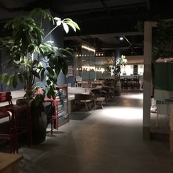 Orangeriet, Boule & Bistro - Quirky and cool interior decor with the open kitchen in the background