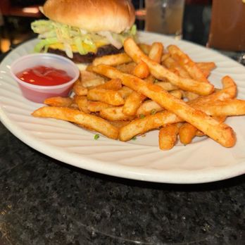 Storyville - Burger and fries - Cocktail Bars Near Me - Chicago, Illinois Storyville - Burger and fries - Cocktail Bars Near Me - Chicago, Illinois