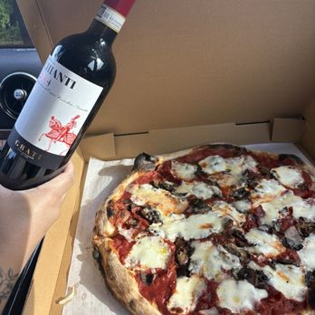 Antonacci Artisan Pizza Cafe - Friuli Venezia giulia and Chianti red wine bottle. - Italian Near Me - Boynton Beach, Florida Antonacci Artisan Pizza Cafe - Friuli Venezia giulia and Chianti red wine bottle. - Italian Near Me - Boynton Beach, Florida