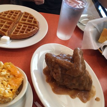 Amy Ruth's - Our smothered white meat chicken & waffles. 2 thumbs up!! - Southern Near Me - New York, New York Amy Ruth's - Our smothered white meat chicken & waffles. 2 thumbs up!! - Southern Near Me - New York, New York