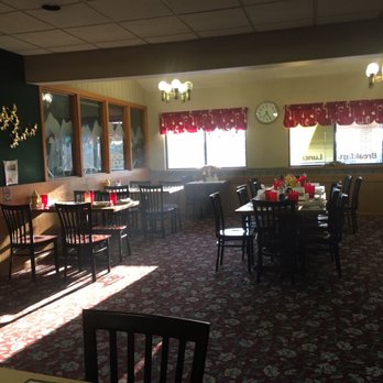 Chinook Grille - a dining room with tables and chairs - American Near Me - Chinook, Montana