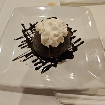 Paesano - Coffee Tartufo - nicely flavored dessert. The chocolate shell is not the hardshell type chocolate, but a more fudgy exterior. - Italian Near Me - Aiea, Hawaii Paesano - Coffee Tartufo - nicely flavored dessert. The chocolate shell is not the hardshell type chocolate, but a more fudgy exterior. - Italian Near Me - Aiea, Hawaii