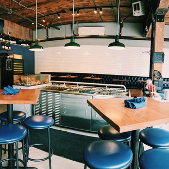 Taylor Shellfish Farms - Inside the restaurant with fresh, love seafood under those lights. - Seafood Near Me - Seattle, Washington