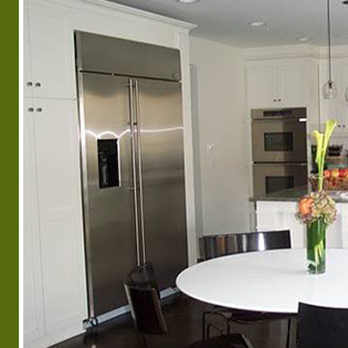 3ccChicago - a kitchen with a table and chairs - General Contractors Near Me
