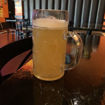 A Touch of Germany - a glass of beer on a table - German Near Me - El Paso, Texas A Touch of Germany - a glass of beer on a table - German Near Me - El Paso, Texas